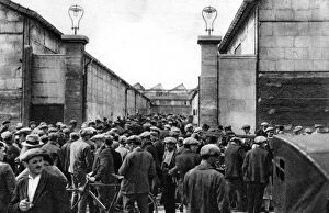 Workers at the entrance of a Billancourt factory, Paris, 1931.Artist: Ernest Flammarion