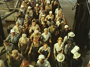 Dungarees Gallery: Workers leaving Pennsylvania shipyards, Beaumont, Texas, 1943. Creator: John Vachon