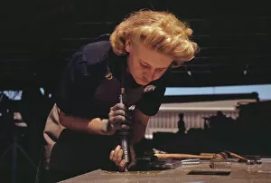 Women At War Gallery: Working in the Assembly and Repair Dept. of the Naval Air Base, Corpus Christi, Texas, 1942
