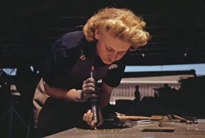 Aeronautics Gallery: Working in the Assembly and Repair Dept. of the Naval Air Base, Corpus Christi, Texas, 1942