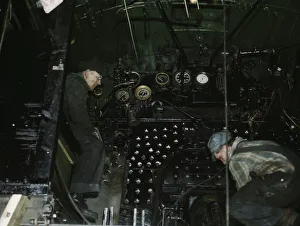 Repair Prints: Working on the cab of a locomotive brought in for repair at the C & NW RR