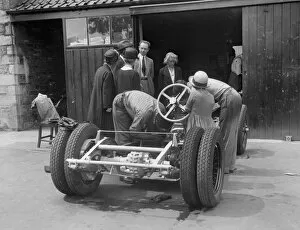 Motor Maintenance Gallery: Working on Raymond Mays Vauxhall-Villiers, c1930s. Artist: Bill Brunell