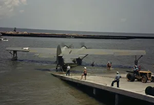 Hollem Howard Prints: Working with a sea-plane at the Naval Air Base