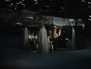 Engineers Prints: Working on the wing center section at the Consolidated Aircraft Corp