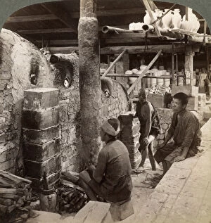 Kiln Gallery: Workmen watching kilns full of Awata porcelain, Kinkosan works, Kyoto, Japan, 1904