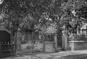 Wrought iron gate and fence, New Orleans or Charleston, South Carolina, between 1920 and 1926. Creator: Arnold Genthe