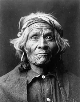 Taos Prints: Wyemah, head-and-shoulders portrait, facing front, c1905. Creator: Edward Sheriff Curtis