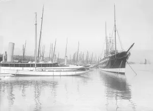 Yachts lying up at Cowes. Creator: Kirk & Sons of Cowes