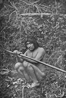 Squatting Prints: A Yaghan Attaching The Head of His Harpoon to the Shaft, 1911