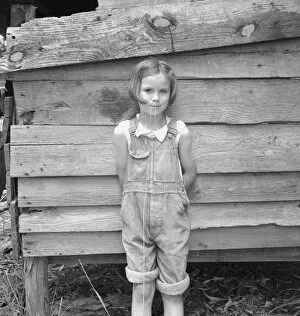 Child Labour Gallery: Eight year old daughter who helps about the tobacco barn... Granville County, North Carolina, 1939