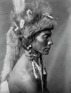 Tribesman Prints: Yellow Kidney, Piegan, c1910. Creator: Edward Sheriff Curtis