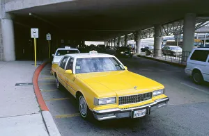 Taxi Prints: Yellow taxi cab at airport