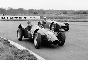 Lotus Prints: Yimkin of D. Sim leads Lotus 7 of P. Warr at Silverstone 1960. Creator: Unknown