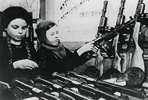 Munition Worker Prints: Young girls assembling machine guns in a Russian factory, 1943