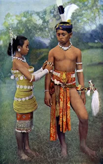 Sea Dayaks Gallery: Young Iban or Sea Dayaks people in gala attire, Borneo, 1922. Artist: Dr Charles Hose