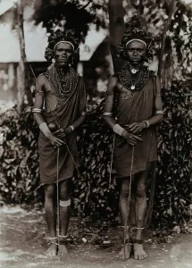 East African Prints: Two young Kikuyu men, carrying sticks, c1900. Creator: Unknown