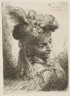 Young man facing three quaters right wearing a fur headdress with a plume, jewel... ca