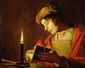 Studying Prints: A Young Man Reading by Candlelight, c.1630. Creator: Matthias Stomer