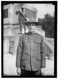 Sherman William Tecumseh Prints: Young man in uniform standing in front of Sherman Monument