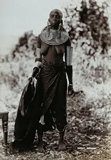 Bangle Prints: A young Masai woman, full length, wearing much jewellery, 1900. Creator: Unknown