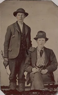 Carpenters Prints: Two Young Men, One Seated and One Standing, Holding Carpentry Tools, 1870s-90s