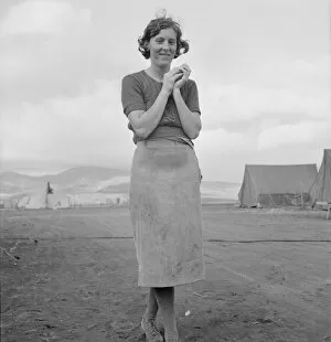 Migrant Collection: Young migrant mother has just finished washing, Merrill FSA camp, Klamath County, Oregon, 1939