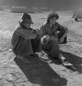Young Oklahoma mother, age eighteen, penniless, stranded in California, Imperial Valley, 1937. Creator: Dorothea Lange