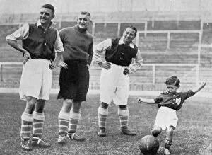 Arsenal Football Club Collection: Young Tony Hapgood shows his skills at Highbury, London, c1933-c19375). Artist: Topical Press Agency