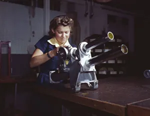 Assembly Line Methods Collection: A young woman employee of North American Aviation, Incorporated... Inglewood, Calif. 1942