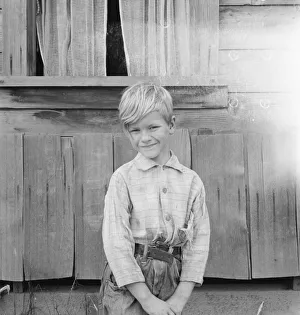 Child Labour Gallery: The youngest Arnold boy who also works at land clearing, Michigan Hill, Western Washington, 1939