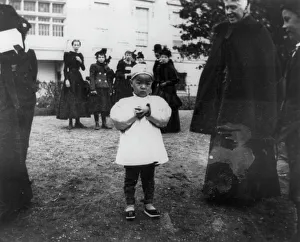 One of the youngest egg rollers on the White House lawn, 1898. Creator: Frances Benjamin Johnston
