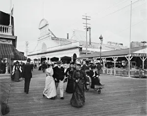 Young's pier & boardwalk, Atlantic City, N.J. between 1895 and 1910. Creator: Unknown. Young's pier & boardwalk, Atlantic City, N.J. between 1895 and 1910. Creator: Unknown