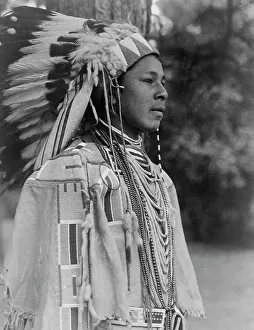Buckskin Prints: Youth in holiday costume-Umatilla, c1910. Creator: Edward Sheriff Curtis