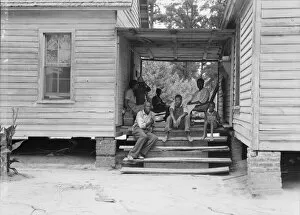 Lunchbreak Collection: Zollie Lyons, Negro sharecropper, home from the field for dinner... Upchurch, North Carolina, 1939