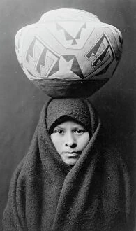 Carrying On Head Collection: Zuni girl with jar, c1903. Creator: Edward Sheriff Curtis